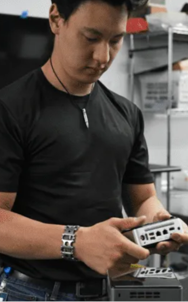 Flexible Hardware Service Technician working on a device