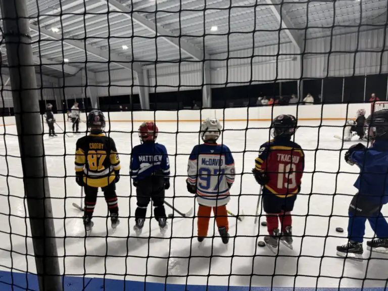 Young hockey players lined up on the ice at the Flexible Arena in Hauppauge, New York
